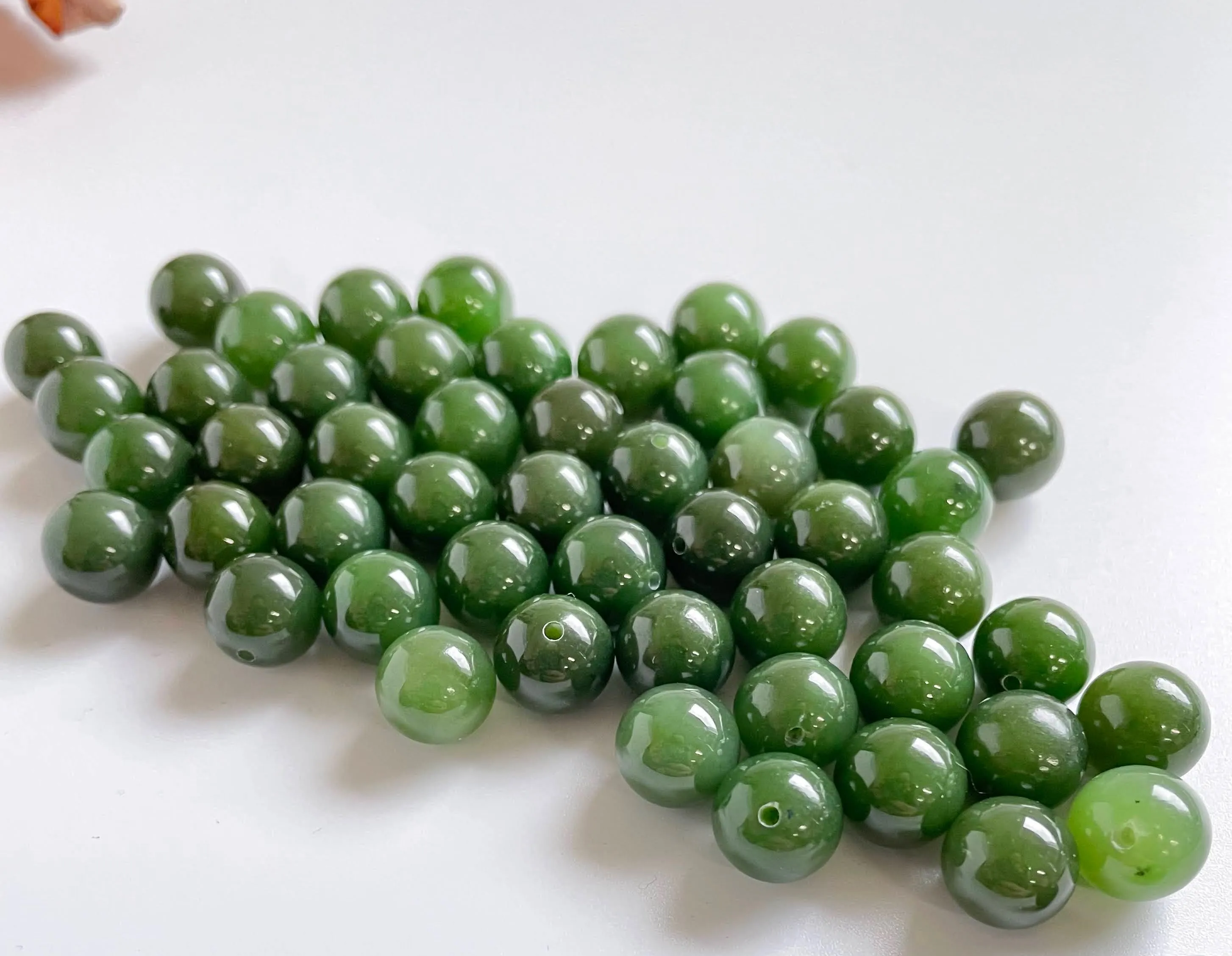 A  Half Drilled 10mm Canadian Jade Beads