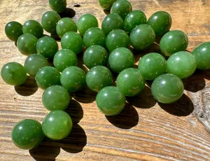 A  Half Drilled 10mm Canadian Jade Beads
