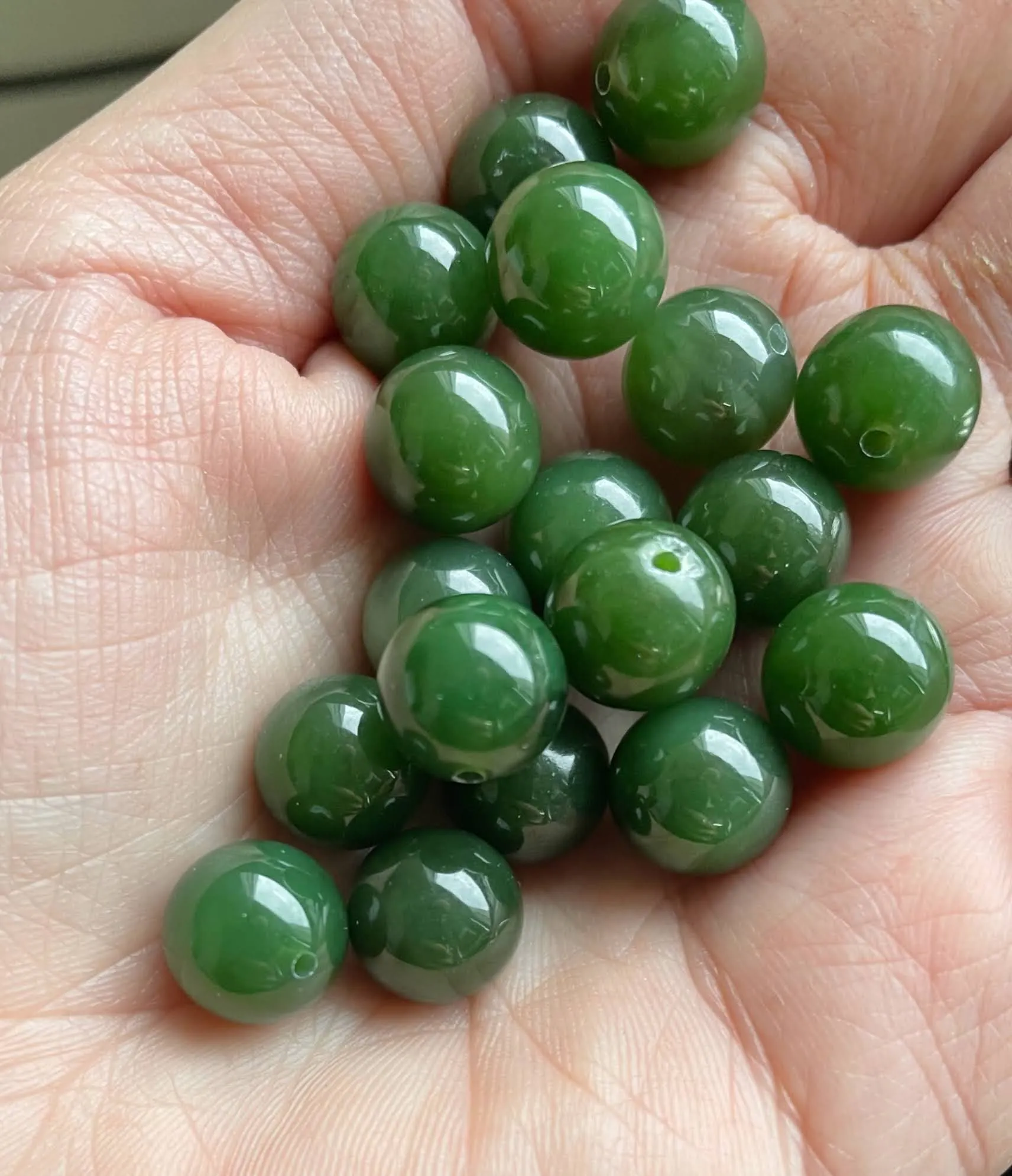 A  Half Drilled 10mm Canadian Jade Beads