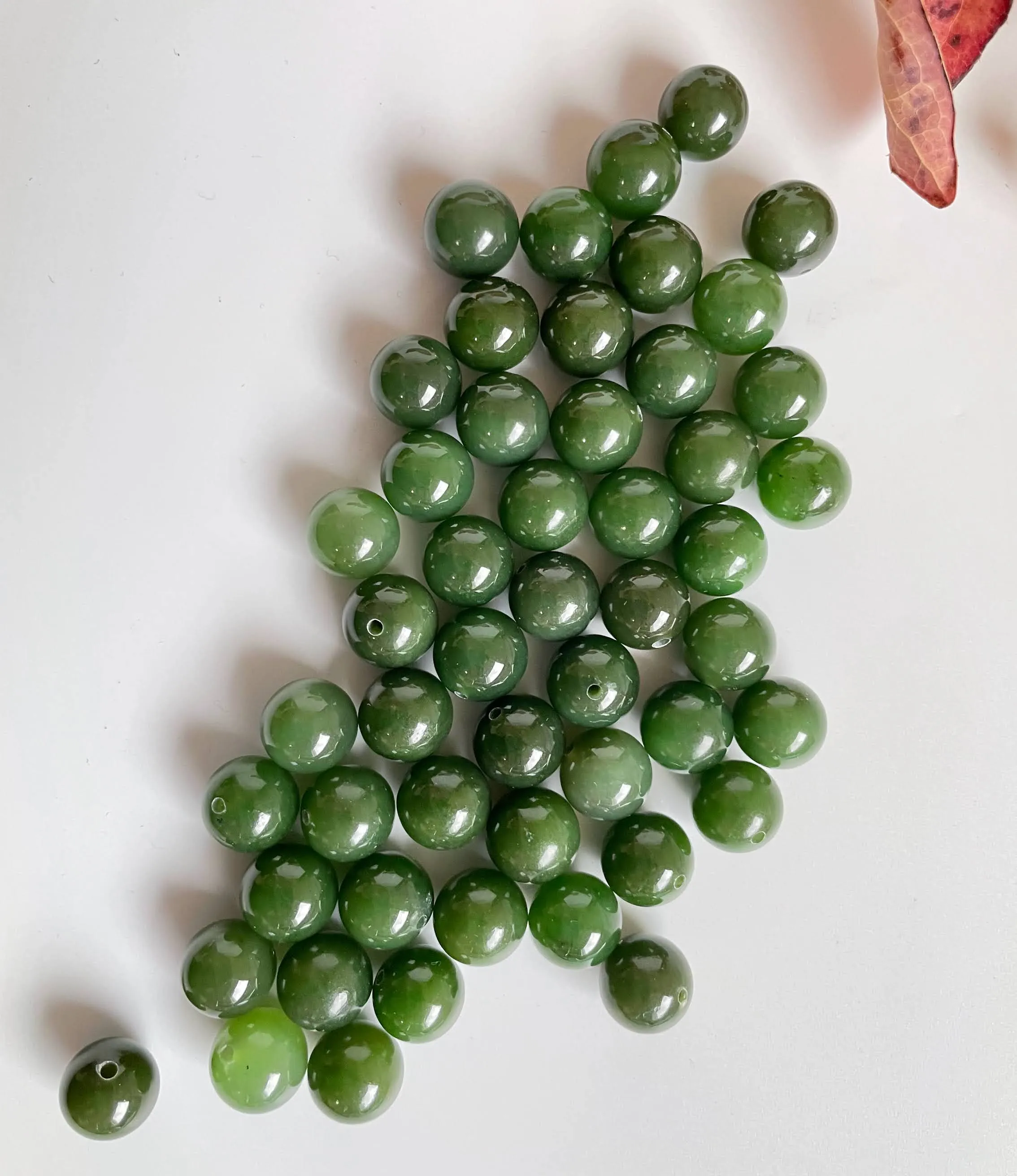 A  Half Drilled 10mm Canadian Jade Beads